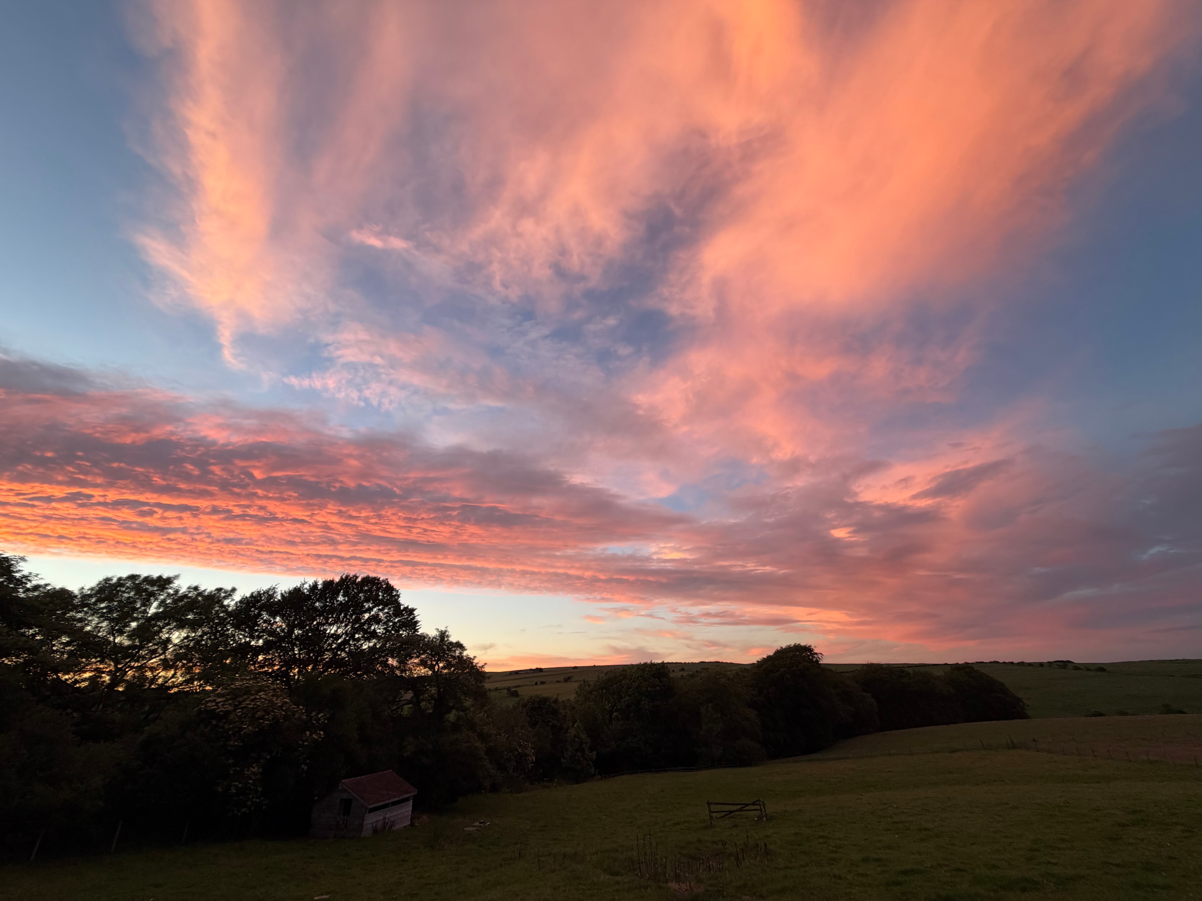 Sunset over the fields at Lane Head Barns, Onecote