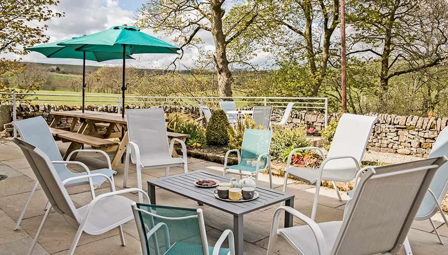 The terrace at Morridge View, looking out over the dry-stone walls