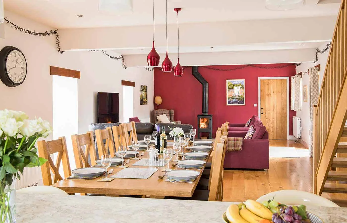 Open-plan living space at Morridge View, with wood burner and staircase